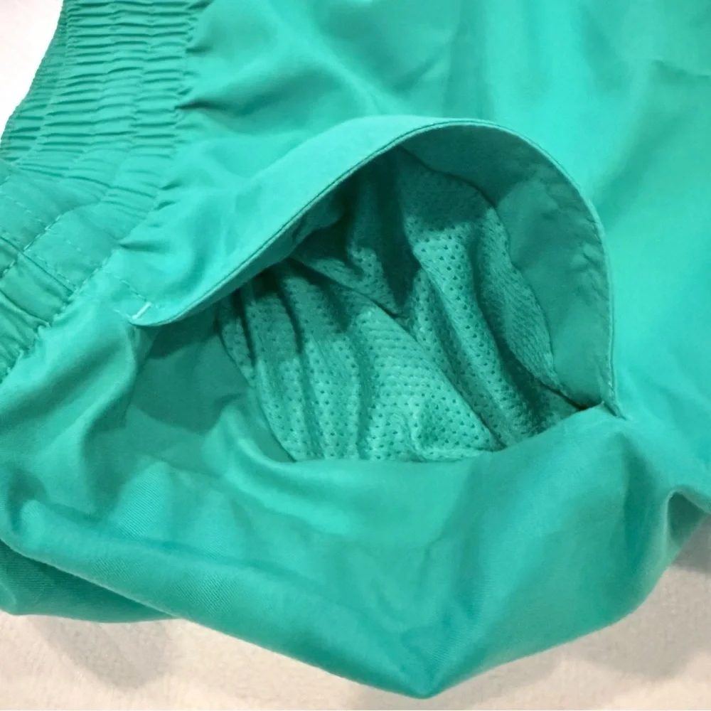 NWT Nike boys size large green swim trunks